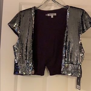 Jennifer Lopez sequence silver jacket